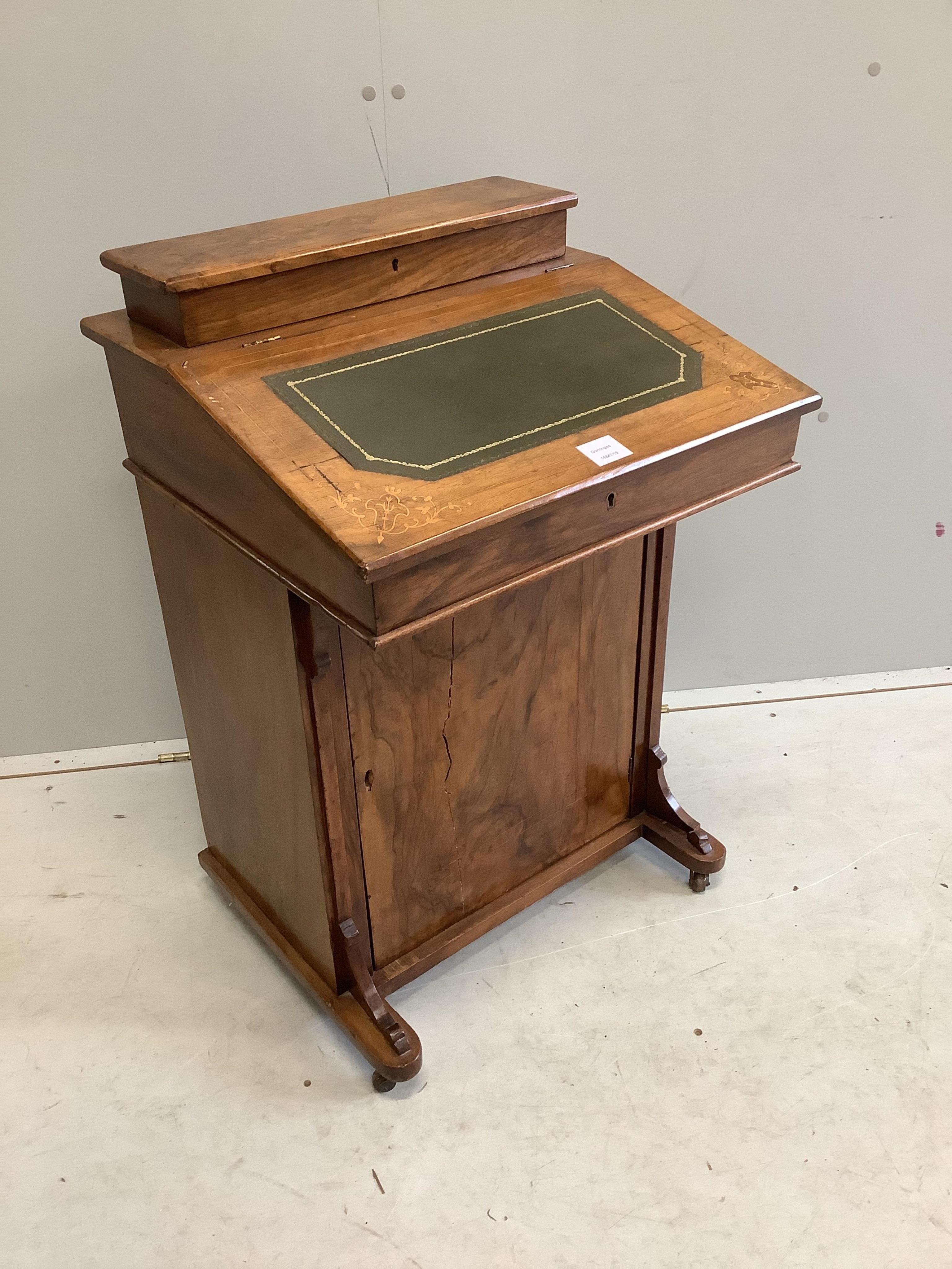 A late Victorian inlaid walnut Davenport, width 53cm, depth 49cm, height 82cm. Condition - poor to fair